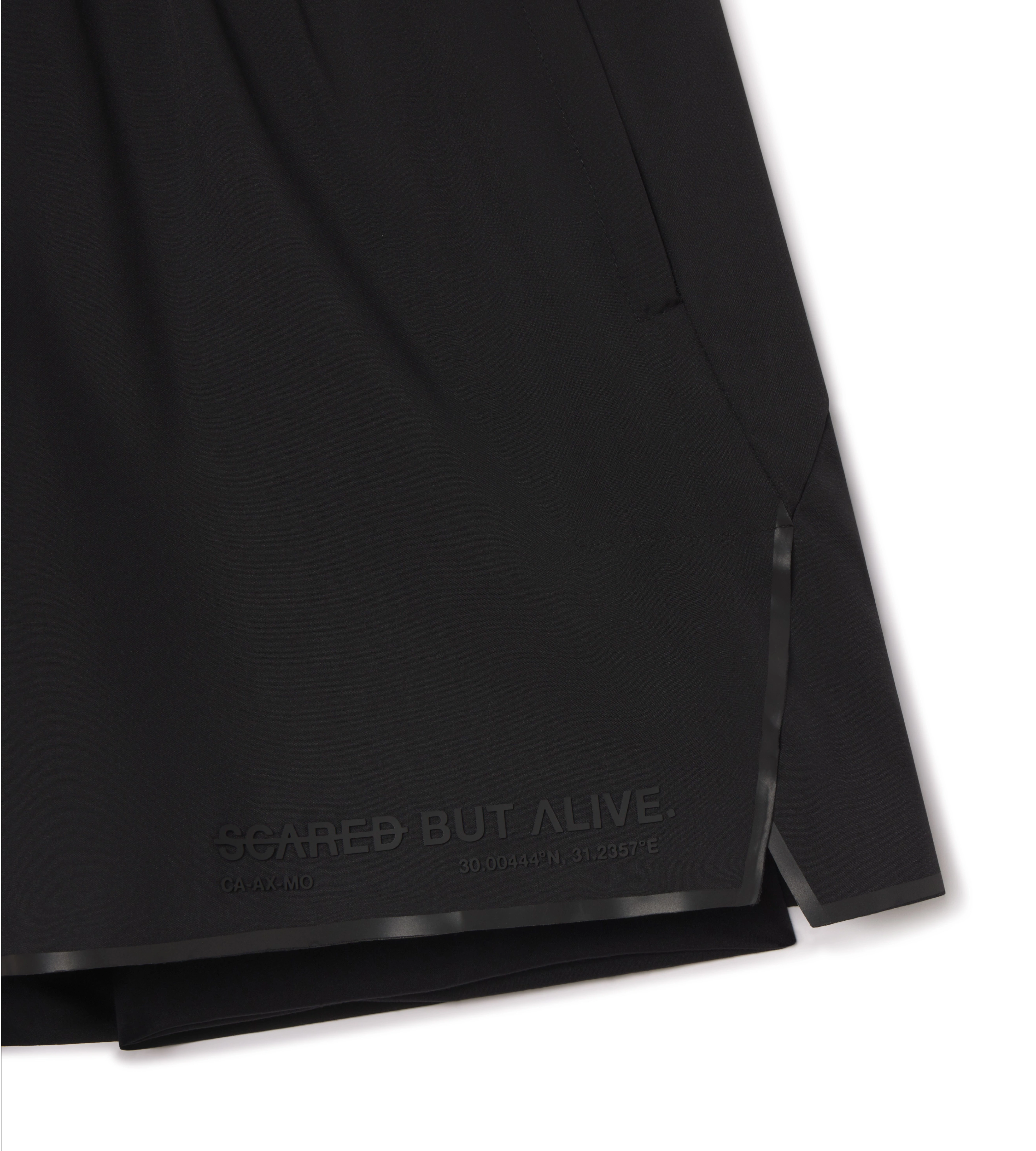 Berlin short tonal logo, pocket, and liner fit detail